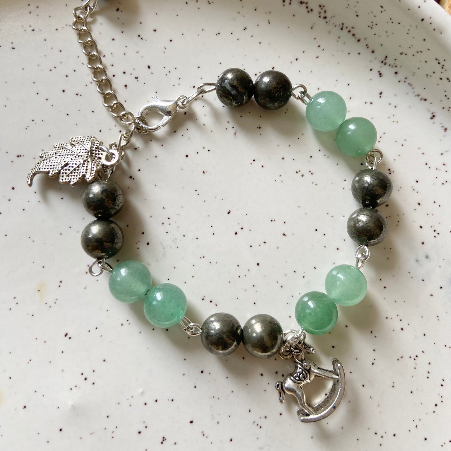 Bracelet associated with Prosperity & Confidence | Pyrite & Green aventurine with Charms