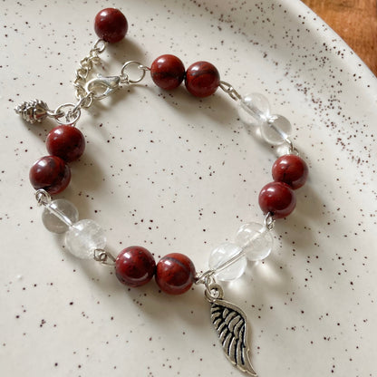 Bracelet associated with Clarity & Well-being | Red Jasper & Clear Quartz with Angel wing Charm