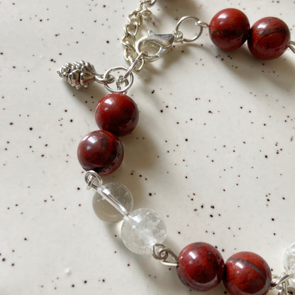 Bracelet associated with Clarity & Well-being | Red Jasper & Clear Quartz with Angel wing Charm