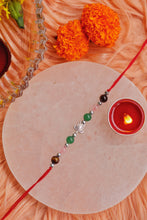 Load image into Gallery viewer, Green Aventurine and Tiger with Tortoise Charm Rakhi
