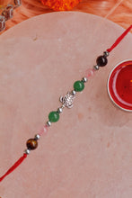 Load image into Gallery viewer, Green Aventurine and Tiger with Tortoise Charm Rakhi
