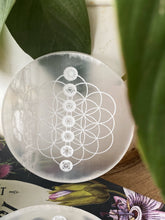 Load image into Gallery viewer, Flower of life with seven chakra symbol Carved Selenite Plate

