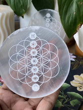 Load image into Gallery viewer, Flower of life with seven chakra symbol Carved Selenite Plate
