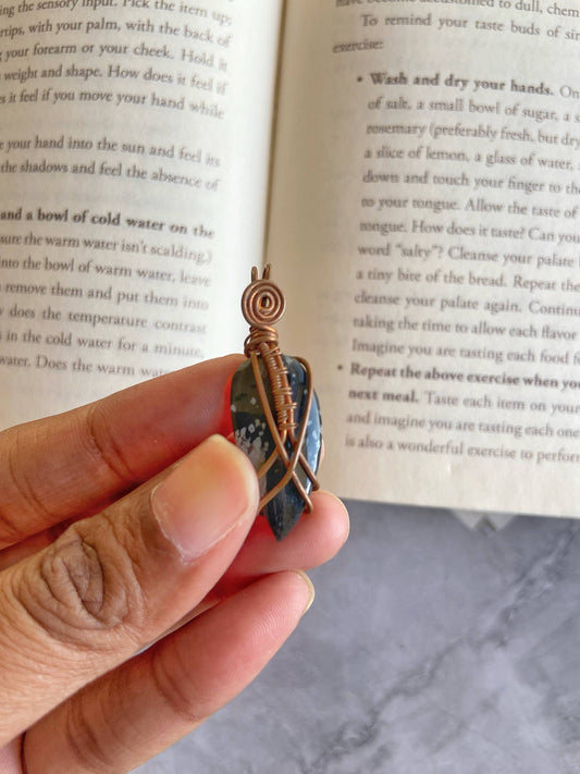 Snowflake obsidian copper wire wrapped pendant