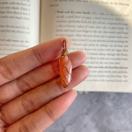 Orange Carnelian copper wire wrapped pendant