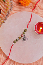 Load image into Gallery viewer, Unakite Rakhi with Ganesh Head Charm
